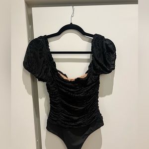 MAJORELLE black bodysuit with floral detailing
